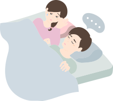 いびきをかいて眠る男性